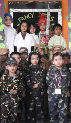GROUP OF CHILDRENS STANDING IN A COSTUMES